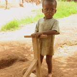  &ndash; young boy with homemade scooter. Freetown, Sierra Leone ©2007 NHA JMansaray photographer