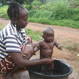  &ndash; Bathing Child. Sierra Leone...© 2007NHA photographs/JBM