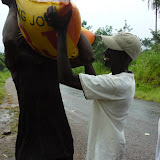  &ndash; delivering rice to small village just outside of Kabala.......© 2007 NHA photos
