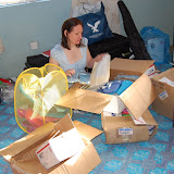  &ndash; unpacking, organizing flip flops and toothbrushes.......© 2007 NHA photos