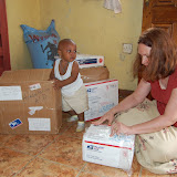  &ndash; opening packages filled with medications, etc.......© 2007 NHA photos