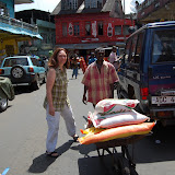  &ndash; hauling rice to car.......© 2007 NHA photos
