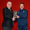 Brian Urquhart presents Tommy Wilson of Rangers with a gift.jpg