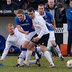 John MacAskill and Brian Macleod crowd out Kyle Hutton.jpg
