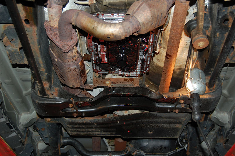 Added a drain plug to my trans pan with lots of pics. Ford Explorer