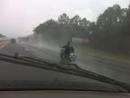 the rain on a bike 70 mph with no helmet. Either brave or stupid