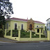 View of Casa Amarilla from Parque Espana (Front)