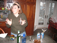 Erika shaking up martini's to break in Beth's new glasses