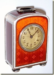 orange gullioche clock