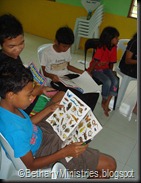 5 Children learning throuogh Stickers Book Programme