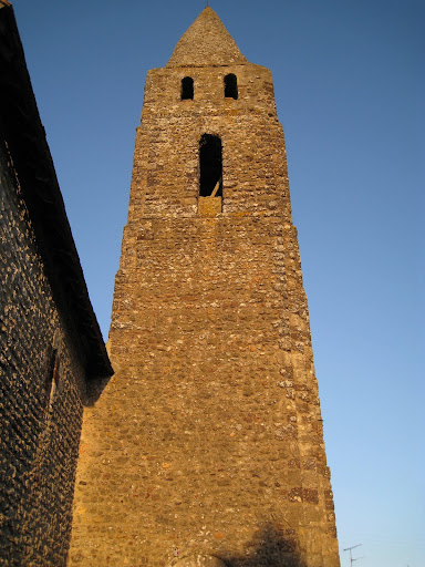 Percy tries to climb the bell tower! The towers total stone construction, including the roof, shows its incredible age & presence!