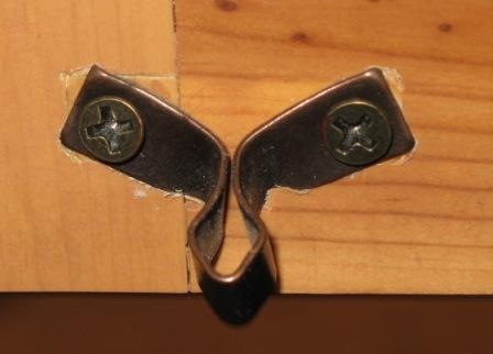 Busted armoire door latch