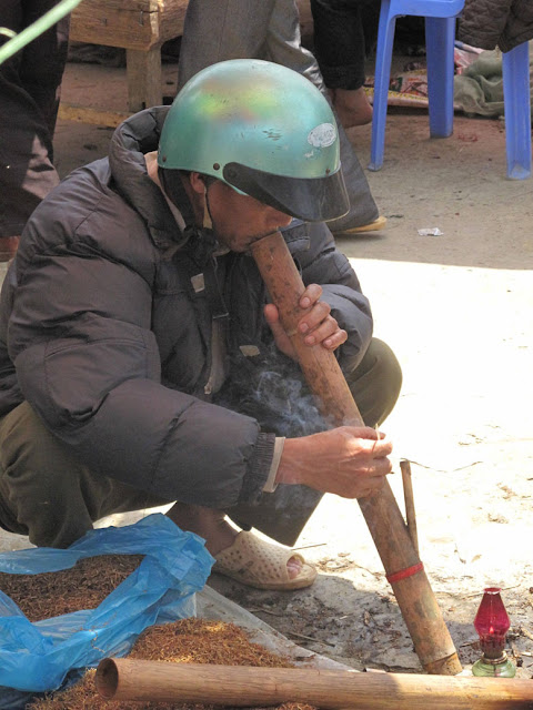 Bac Ha Market_H'Mong Flower Tribe_Lao Cai_Vietnam_H'Mong Man Smoking