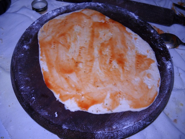 Dough rolled & smeared with ketchup