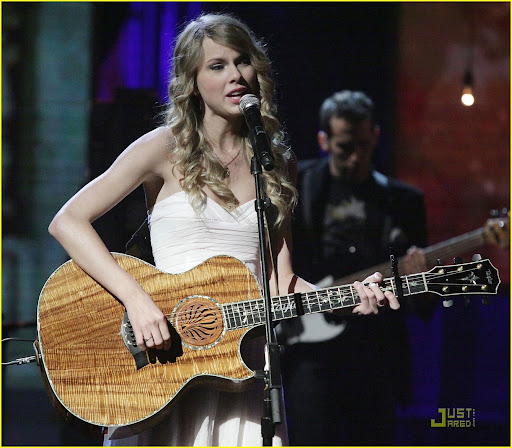 Taylor Swift
performs on 'Hope for Haiti Now: A Global Benefit for Earthquake Relief'
Los Angeles, California, USA - 22.01.10
Copyright: Mark Davis/HOPE FOR HAITI NOW
This is a PR photo. WENN does not claim any ownership including but not limited to Copyright or License in the attached material. Fees charged by WENN are for WENN's services only, and do not, nor are they intended to, convey to the user any ownership of Copyright or License in the material. By publishing this material you expressly agree to indemnify and to hold WENN and its directors, shareholders and employees harmless from any loss, claims, damages, demands, expenses (including legal fees), or any causes of action or allegation against WENN arising out of or connected in any way with publication of the material.
Supplied by WENN.com