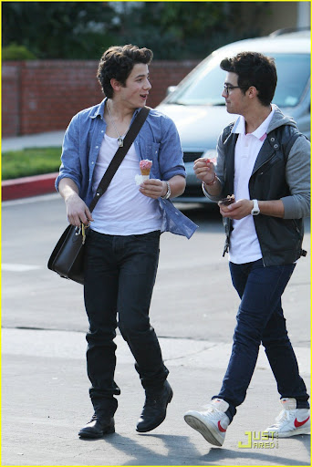 37566, LOS ANGELES, CALIFORNIA - Wednesday February 10, 2010. **EXCLUSIVE** Nick (left) and Joe (right) Jonas share a laugh after getting ice cream together in LA. Joe walked Nick to his truck and gave him a brotherly hug before departing. Joe Jonas, looking fashionable in his two-tone jacket and thick frame glasses, is seen wearing Nike high top sneakers. Nick, on the other hand, kept it more casual in an open button up shirt and shoulder bag worn with dark denim pants and black boots. Photograph: Anthony, PacificCoastNews.com**FEE MUST BE AGREED PRIOR TO USAGE** **E-TABLET/IPAD & MOBILE PHONE APP PUBLISHING REQUIRES ADDITIONAL FEES** UK OFFICE:+44 131 557 7760/7761 US OFFICE:1 310 261 9676