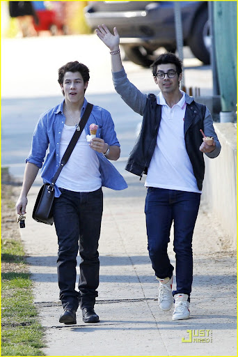 37566, LOS ANGELES, CALIFORNIA - Wednesday February 10, 2010. **EXCLUSIVE** Nick (left) and Joe (right) Jonas share a laugh after getting ice cream together in LA. Joe walked Nick to his truck and gave him a brotherly hug before departing. Joe Jonas, looking fashionable in his two-tone jacket and thick frame glasses, is seen wearing Nike high top sneakers. Nick, on the other hand, kept it more casual in an open button up shirt and shoulder bag worn with dark denim pants and black boots. Photograph: Anthony, PacificCoastNews.com**FEE MUST BE AGREED PRIOR TO USAGE** **E-TABLET/IPAD & MOBILE PHONE APP PUBLISHING REQUIRES ADDITIONAL FEES** UK OFFICE:+44 131 557 7760/7761 US OFFICE:1 310 261 9676