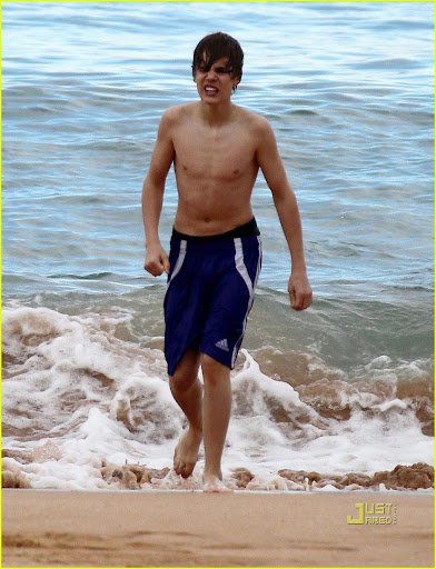 04-24-10 Sydney, Australia  Singer Justin Bieber and his entourage<br /> spend the afternoon at Whale Beach in Sydney. Justin went in for a swim<br /> and played some football on the beach in Sydney, Australia...  <br />Non-Exclusive Pix by Flynet ©2010 818-307-4813  Nicolas 310-869-0177  <br />Scott