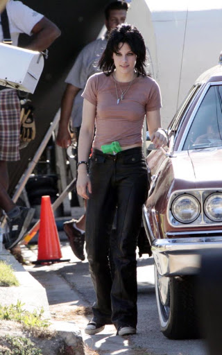 07-22-09 Los Angeles, CAActresses Kristen Stewart and Dakota Fanning on the set of their upcoming movie 'The Runaways' in Los Angeles. In a couple scenes Kristen has a neon green water gun stuffed in the front of her pants...Non-Exclusive Pix by Flynet ©2009818-307-4813  Nicolas310-869-0177  Scott