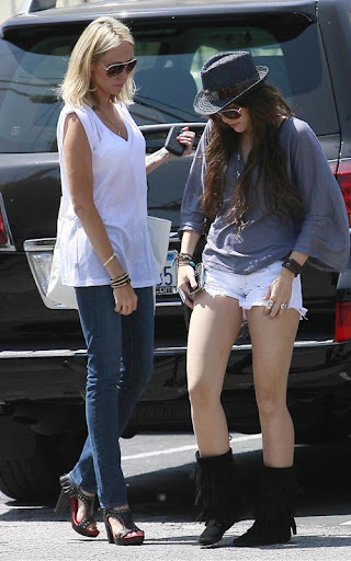08-08-09 Toluca Lake, CA  Exclusive: Miley Cyrus and her mom Tish Cyrus our for lunch at Mo's Restaurant in Toluca Lake, CA. They then stopped by Starbucks for a meeting. Also notice how an old guy stops to pose for a picture, weird considering that she just had a restraining order put on an old guy at a location where she was filming...  Exclusive Pix by Flynet ©2009 818-307-4813  Nicolas 310-869-0177  Scott