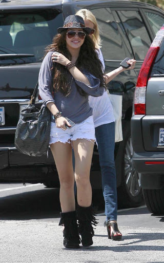 08-08-09 Toluca Lake, CA  Exclusive: Miley Cyrus and her mom Tish Cyrus our for lunch at Mo's Restaurant in Toluca Lake, CA. They then stopped by Starbucks for a meeting. Also notice how an old guy stops to pose for a picture, weird considering that she just had a restraining order put on an old guy at a location where she was filming...  Exclusive Pix by Flynet ©2009 818-307-4813  Nicolas 310-869-0177  Scott