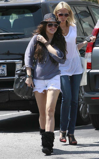 08-08-09 Toluca Lake, CA  Exclusive: Miley Cyrus and her mom Tish Cyrus our for lunch at Mo's Restaurant in Toluca Lake, CA. They then stopped by Starbucks for a meeting. Also notice how an old guy stops to pose for a picture, weird considering that she just had a restraining order put on an old guy at a location where she was filming...  Exclusive Pix by Flynet ©2009 818-307-4813  Nicolas 310-869-0177  Scott