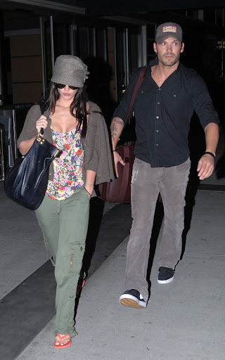 Megan Fox and Brian Austin Green together at the airport. Despite the dark, the Transformers star wore her sunglasses and flip flops as the pair made their way to a waiting limo. <P> Pictured: Megan Fox and Brian Austin Green <B>Ref: SPL117715 050809 </B><BR/> Picture by: Splash News<BR/> </P><P> <B>Splash News and Pictures</B><BR/> Los Angeles: 310-821-2666<BR/> New York: 212-619-2666<BR/> London: 870-934-2666<BR/> photodesk@splashnews.com<BR/> </P>