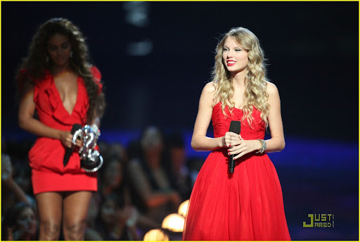 NEW YORK - SEPTEMBER 13:  Taylor Swift (R) speaks after Beyonce (L) allowed her to finish her speech, that was cut short by Kanye West, after Beyonce won "Best Video of the Year" during the 2009 MTV Video Music Awards at Radio City Music Hall on September 13, 2009 in New York City.  (Photo by Christopher Polk/Getty Images)