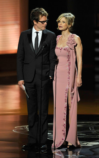 LOS ANGELES, CA - SEPTEMBER 20: Actor Kevin Bacon (L) and actress Kyra Sedgwick present the Outstanding Supporting Actress in a Miniseries or Movie award onstage during the 61st Primetime Emmy Awards held at the Nokia Theatre on September 20, 2009 in Los Angeles, California. (Photo by Kevin Winter/Getty Images) *** Local Caption *** Kevin Bacon;Kyra Sedgwick