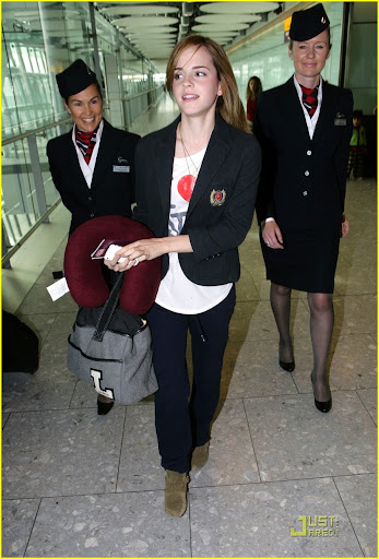 ©BAUER-GRIFFIN.COM Emma Watson arrives to Heathrow airport  wearing an "I love NY" shirt. NON-EXCLUSIVE      September 20 , 2009    Job:  90921W7     London, England  www.bauergriffin.com www.bauergriffinonline.com [491]