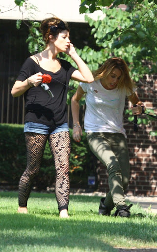 miley-ashley-071610-24.jpg