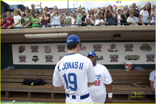 NEW BRITAIN, CT - AUGUST 13: Jonas Brother Kevin Jonas thrills the crowds playing a Road Dogs baseball game to support Allstate's X the TXT at the New Britain Stadium on August 13, 2010 in New Britain, Connecticut. (Photo by Wendy Carlson/Getty Images)