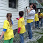 ACTS volunteers work on a painting project