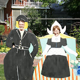 Lt. Governor Patty Judge poses with Press Secretary Troy Price inside the Historical Village in Pella Wednesday.