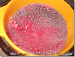 straining pomegranates