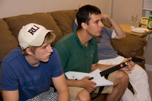 Gabe and his friend playing Guitar Hero