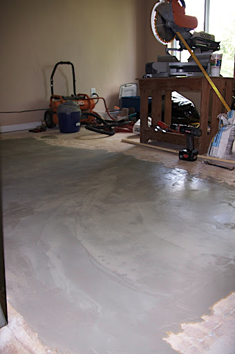 Because the beams were uneven, the subfloor was uneven so we had to level it with some floor leveler.