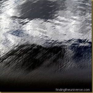 Clouds reflecting in the water - Tasmanian beach