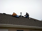 The roofers came out the next day. They finished right before it began to sprinkle and did a great job.