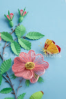 Quilled dog-rose flowers, buds, and butterfly