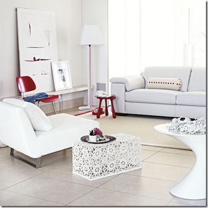 White bright airy living room red accented items soga armchair chair stool floor light canvas artwork tiled flooring L etc 05/2007 pub orig