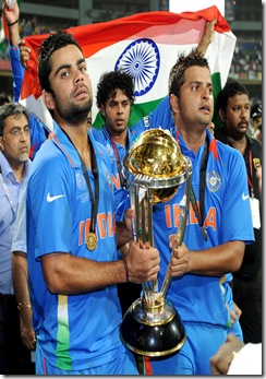 virat and raina with world cup trophy 2011