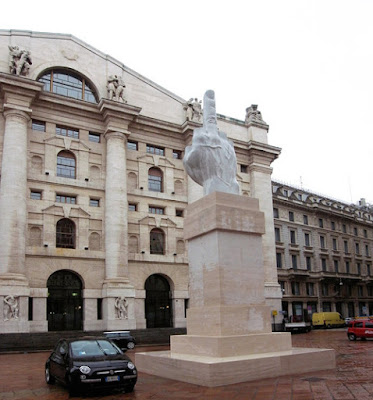 &#8216;L.O.V.E.&#8217; By Maurizio Cattelan.   In Milan&#8217;s Piazza Affari, in front of the Italian stock exchange building.jpeg