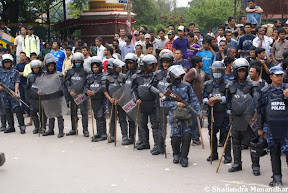Police standby to avoid an altercation