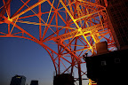 The lower base of Tokyo Tower is already on eye-level with some building roof tops