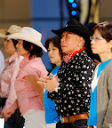 The old cowboy in the middle just turned 80 years old!