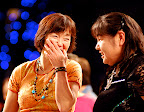 Sharing a laugh between dances.
