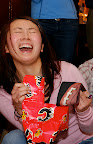 The pain of receiving a football tie is self-evident in poor Hitomi's reaction.