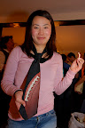Hitomi mastered her pain and looks quite fetching in a tie that would make Tom Landry proud.