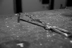 An instrument for spreading open a surgical incision
